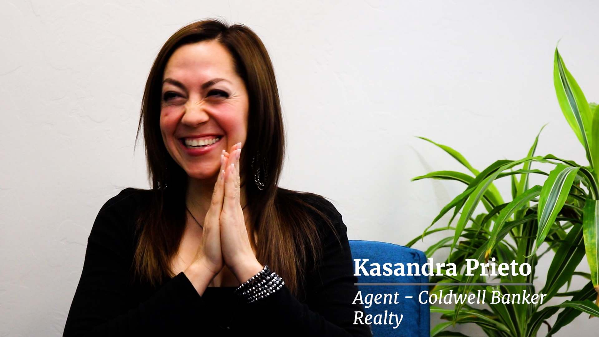 Close-up of Kasandra Prieto smiling during the Housing4Good interview