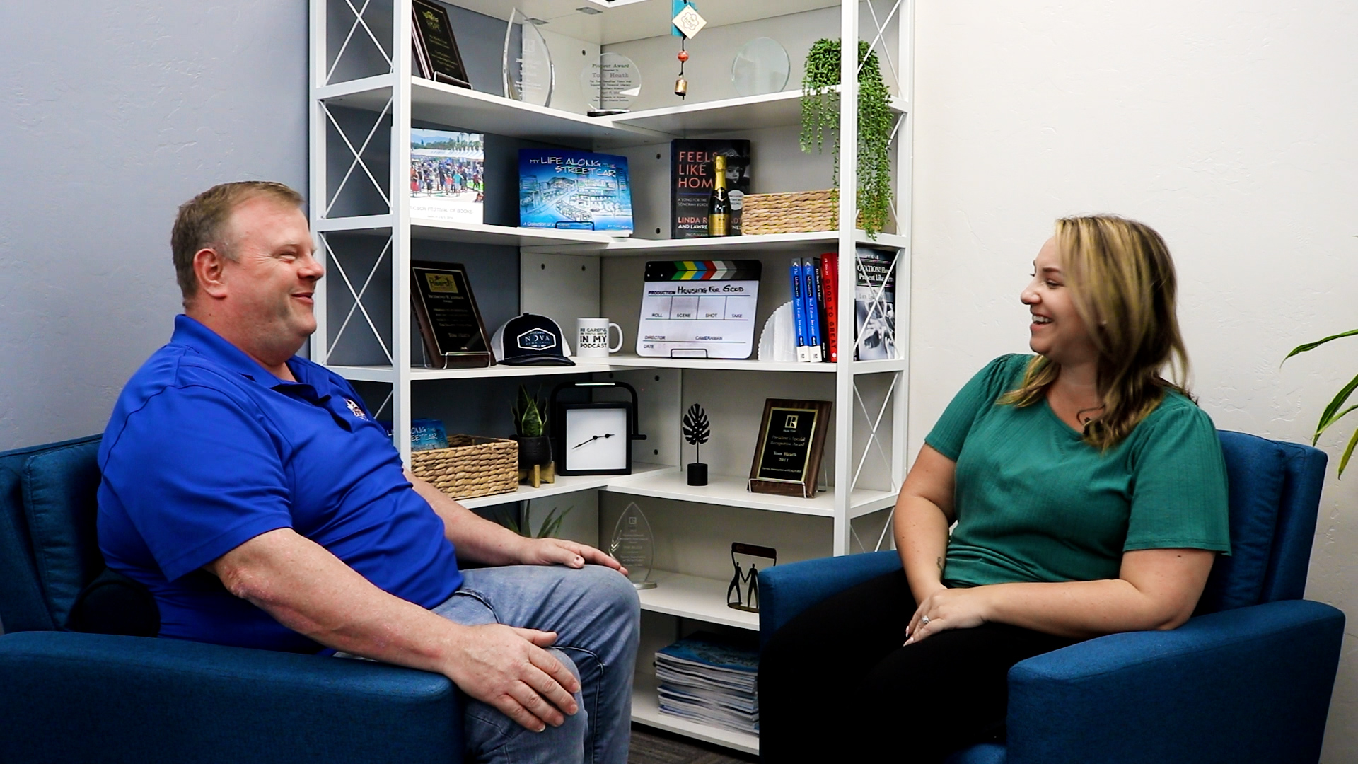 Tom Heath and Krystine Eppley sharing a laugh during their Housing4Good interview.